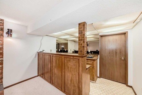 183 Dalcastle Way Nw, Calgary, AB - Indoor Photo Showing Other Room