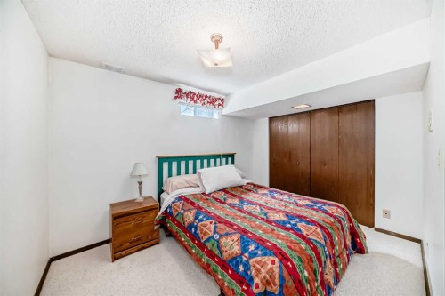 183 Dalcastle Way Nw, Calgary, AB - Indoor Photo Showing Bedroom