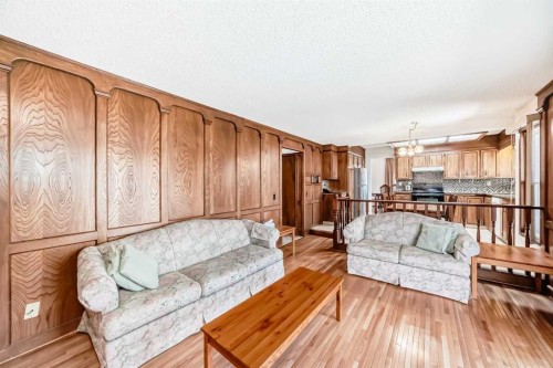 183 Dalcastle Way Nw, Calgary, AB - Indoor Photo Showing Living Room