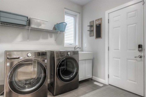 54 Silverado Plains Common Sw, Calgary, AB - Indoor Photo Showing Laundry Room