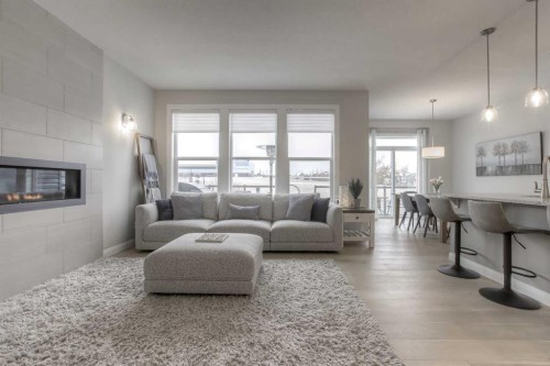 54 Silverado Plains Common Sw, Calgary, AB - Indoor Photo Showing Living Room With Fireplace