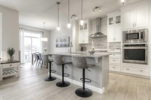 54 Silverado Plains Common Sw, Calgary, AB - Indoor Photo Showing Kitchen With Upgraded Kitchen