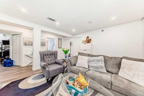 244 Coverdale Court Ne, Calgary, AB - Indoor Photo Showing Living Room