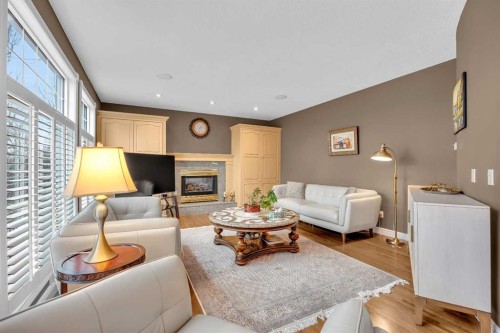 216 Evergreen Heath Sw, Calgary, AB - Indoor Photo Showing Living Room With Fireplace