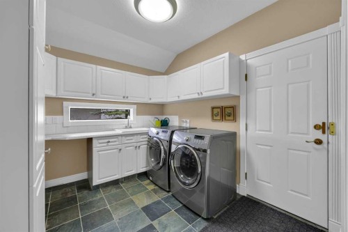 216 Evergreen Heath Sw, Calgary, AB - Indoor Photo Showing Laundry Room