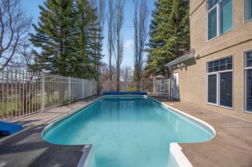 216 Evergreen Heath Sw, Calgary, AB - Outdoor With In Ground Pool With Exterior