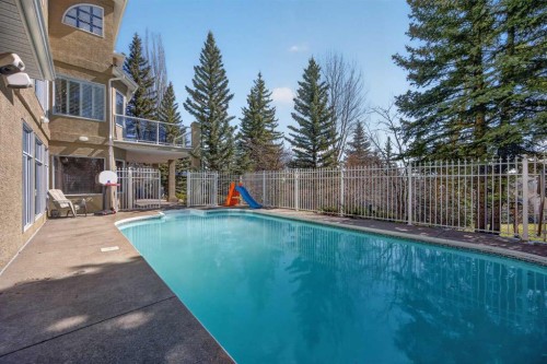 216 Evergreen Heath Sw, Calgary, AB - Outdoor With In Ground Pool