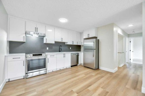 8-75 Templemont Way Ne, Calgary, AB - Indoor Photo Showing Kitchen With Stainless Steel Kitchen