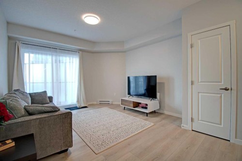 5121-20295 Seton Way Se, Calgary, AB - Indoor Photo Showing Living Room