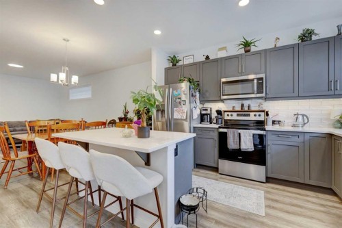 314 Midgrove Link Sw, Airdrie, AB - Indoor Photo Showing Kitchen With Stainless Steel Kitchen With Upgraded Kitchen