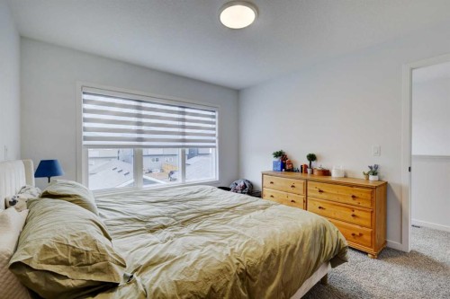 314 Midgrove Link Sw, Airdrie, AB - Indoor Photo Showing Bedroom