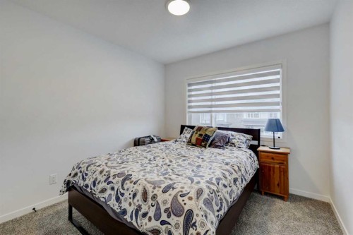 314 Midgrove Link Sw, Airdrie, AB - Indoor Photo Showing Bedroom