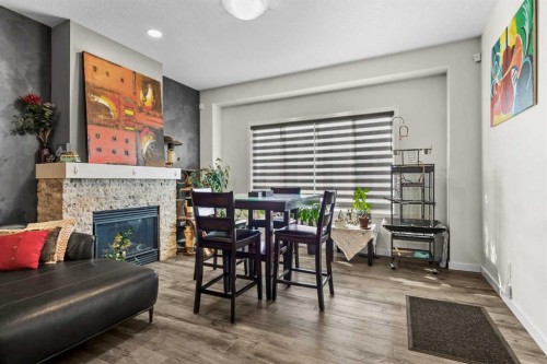 204 Walden Parade Se, Calgary, AB - Indoor Photo Showing Living Room With Fireplace