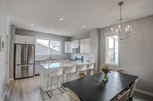 52 Masters Link Se, Calgary, AB - Indoor Photo Showing Dining Room