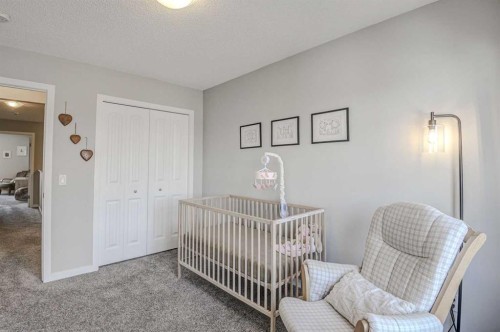 52 Masters Link Se, Calgary, AB - Indoor Photo Showing Bedroom