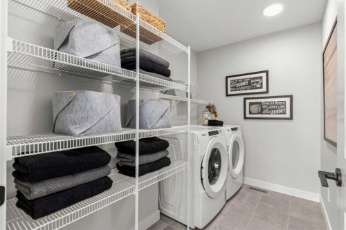 291 Rivercrest Way, Cochrane, AB - Indoor Photo Showing Laundry Room