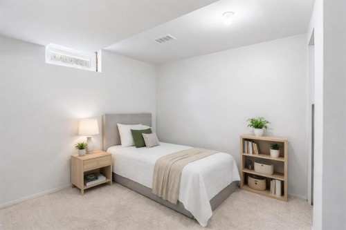 107 Nottingham Road, Calgary, AB - Indoor Photo Showing Bedroom