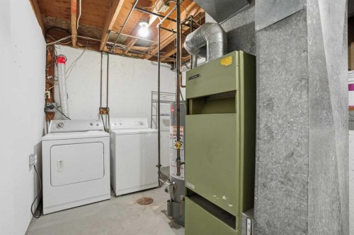 107 Nottingham Road, Calgary, AB - Indoor Photo Showing Laundry Room