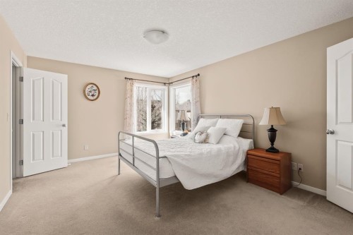 430 Discovery Ridge Boulevard Sw, Calgary, AB - Indoor Photo Showing Bedroom