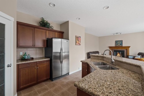 430 Discovery Ridge Boulevard Sw, Calgary, AB - Indoor Photo Showing Kitchen With Double Sink