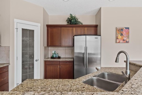 430 Discovery Ridge Boulevard Sw, Calgary, AB - Indoor Photo Showing Kitchen With Double Sink