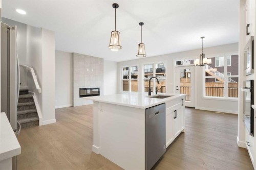 334 Rivercrest Road, Cochrane, AB - Indoor Photo Showing Kitchen With Upgraded Kitchen
