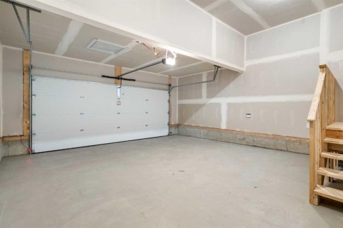 334 Rivercrest Road, Cochrane, AB - Indoor Photo Showing Garage