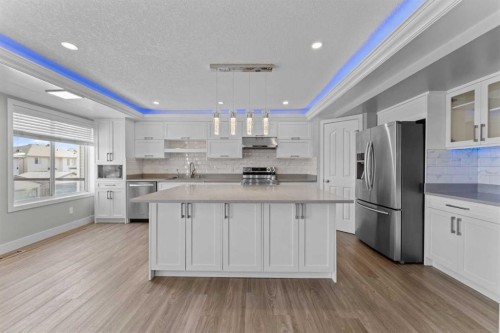 28 Panamount Lane Nw, Calgary, AB - Indoor Photo Showing Kitchen With Upgraded Kitchen