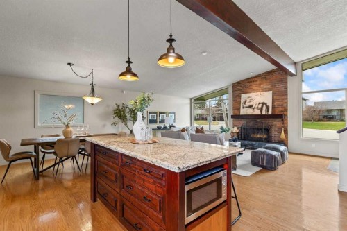 36 Lake Twintree Place Se, Calgary, AB - Indoor With Fireplace