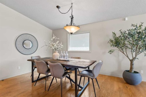 36 Lake Twintree Place Se, Calgary, AB - Indoor Photo Showing Dining Room
