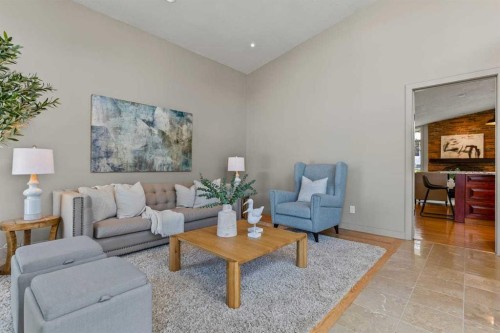 36 Lake Twintree Place Se, Calgary, AB - Indoor Photo Showing Living Room
