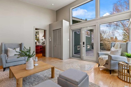 36 Lake Twintree Place Se, Calgary, AB - Indoor Photo Showing Living Room