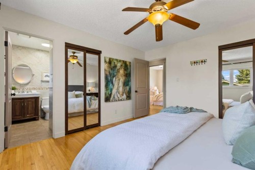 36 Lake Twintree Place Se, Calgary, AB - Indoor Photo Showing Bedroom