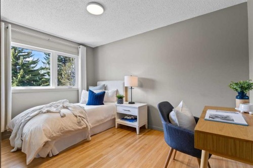 36 Lake Twintree Place Se, Calgary, AB - Indoor Photo Showing Bedroom
