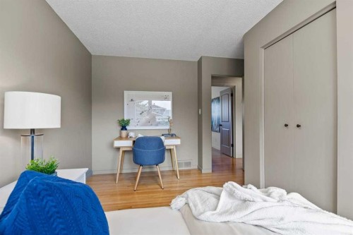 36 Lake Twintree Place Se, Calgary, AB - Indoor Photo Showing Bedroom