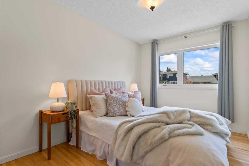36 Lake Twintree Place Se, Calgary, AB - Indoor Photo Showing Bedroom