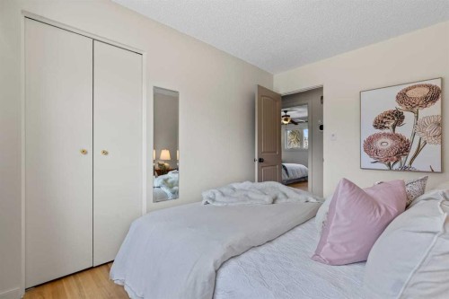 36 Lake Twintree Place Se, Calgary, AB - Indoor Photo Showing Bedroom