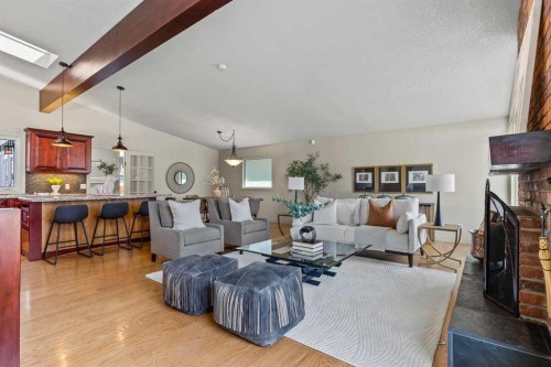 36 Lake Twintree Place Se, Calgary, AB - Indoor Photo Showing Living Room