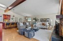 36 Lake Twintree Place Se, Calgary, AB  - Indoor Photo Showing Living Room 