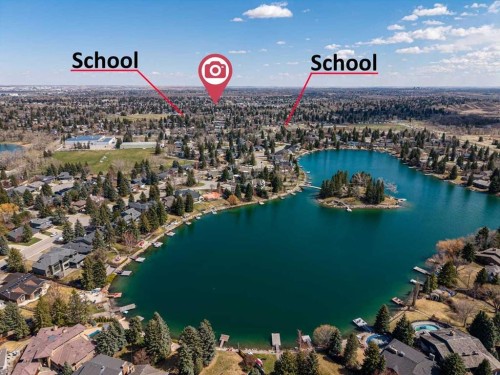 36 Lake Twintree Place Se, Calgary, AB - Outdoor With Body Of Water With View