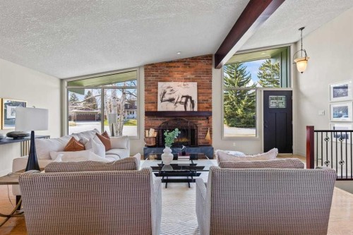 36 Lake Twintree Place Se, Calgary, AB - Indoor Photo Showing Living Room