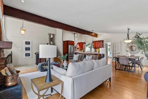 36 Lake Twintree Place Se, Calgary, AB - Indoor Photo Showing Living Room