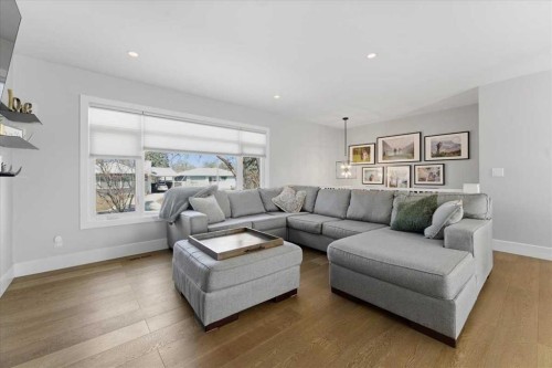 719 Allden Place Se, Calgary, AB - Indoor Photo Showing Living Room