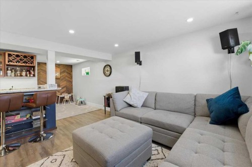 719 Allden Place Se, Calgary, AB - Indoor Photo Showing Living Room