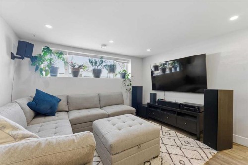 719 Allden Place Se, Calgary, AB - Indoor Photo Showing Living Room