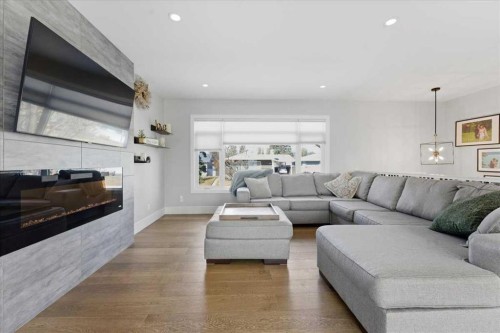 719 Allden Place Se, Calgary, AB - Indoor Photo Showing Living Room
