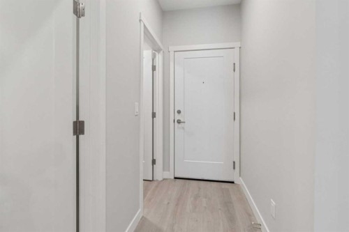 201-655 Shawnee Square Sw, Calgary, AB - Indoor Photo Showing Other Room