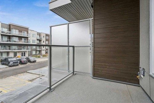 201-655 Shawnee Square Sw, Calgary, AB - Outdoor With Balcony With Exterior