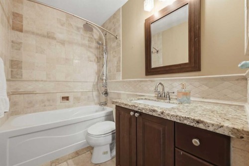 729 Woodbriar Place Sw, Calgary, AB - Indoor Photo Showing Bathroom