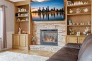 729 Woodbriar Place Sw, Calgary, AB  - Indoor Photo Showing Living Room With Fireplace 